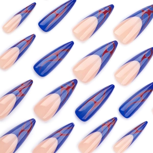 Long stiletto press-on nails featuring blue base and red flame texture pattern
