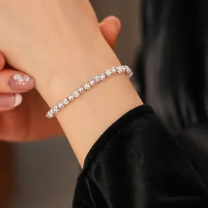 Elegant pearl bracelet with diamond-encrusted beads in a vintage French luxury style