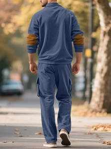 Detail of men's blue corduroy set with contrast elbow patches and side cargo pockets