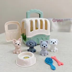 Kids' toy pet carrier set with four puppy figurines and grooming accessories in mint green