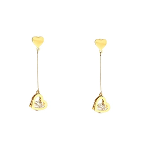 Elegant gold titanium long tassel earrings featuring hollow heart pendant and zircon stone