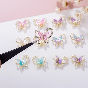 Exquisite laser aurora butterfly nail charms with gold edges and crystal rhinestones