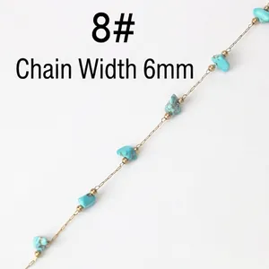 Detail of 6mm handmade stainless steel chain with turquoise stones and golden beads