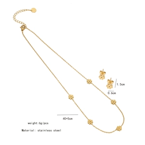 Detail showing dimensions of gold stainless steel flower necklace and earring set