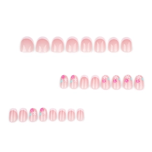 Short round press-on nails with pink jelly base, white French tips, and floral patterns