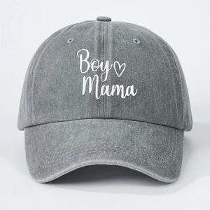 Detail of grey washed cotton baseball cap with Boy Mama embroidery and heart design