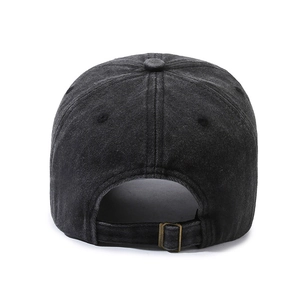 Rear view of washed vintage baseball cap with adjustable metal buckle and six-panel crown