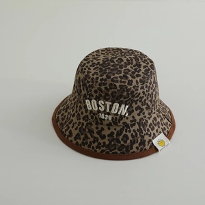 Kids leopard print bucket hat with Boston embroidery and brown trim on gray background