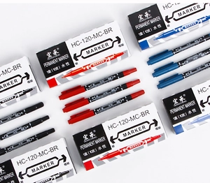 Macro shot of 10-piece boxes featuring red, blue, and black dual-tip marker pens