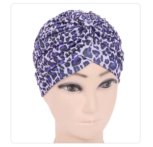 Detailed view of purple leopard print headwrap made of elastic knitted fabric for women