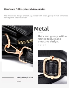 Detail of black lychee grain leather handbag with high-gloss gold hardware and D-rings