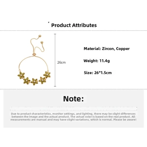 Detail view of gold flower bracelet with green zircon including product size and weight
