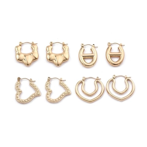 Irregular gold earrings set with heart and oval designs in stainless steel jewelry