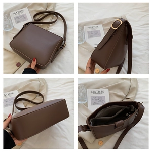 Deep brown PU leather shoulder bucket bag with adjustable strap and golden hardware accents
