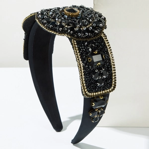 Luxurious black wide headband with sparkling rhinestones and gold chain for parties