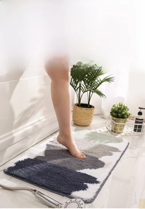 Detail of high-density geometric fiber mat showing thick texture and absorbent pile