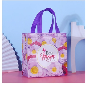 Detail of purple non-woven gift bag with Best Mom Ever floral printing for Mother's Day
