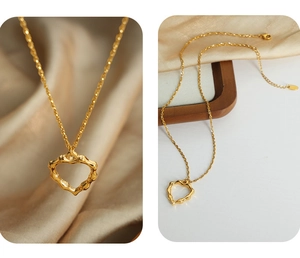 Détail du pendentif cœur irrégulier en acier plaqué or 18 carats sur soie
