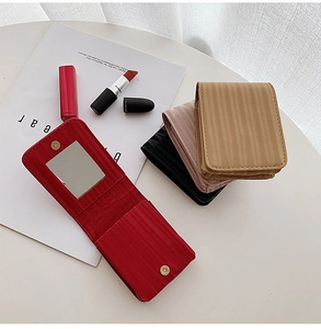 Mini makeup bags with mirror in red, pink, beige, and black with striped texture