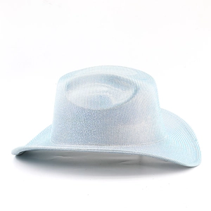 Macro detail of western cowboy hat featuring shimmering blue glitter and metallic finish