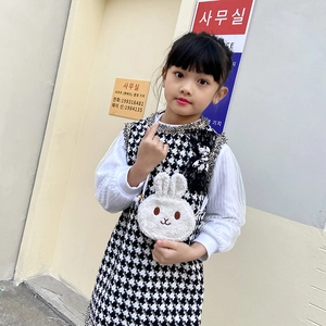 Cute white plush rabbit shoulder bag for girls paired with houndstooth dress