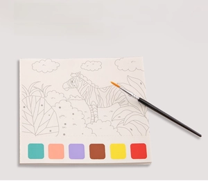 Detail of DIY watercolor painting book featuring zebra illustration and six-color pigment strip