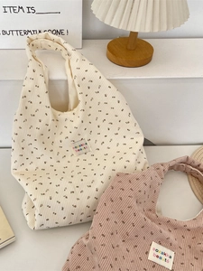 Floral corduroy tote bags in cream and pink colors for casual autumn fashion