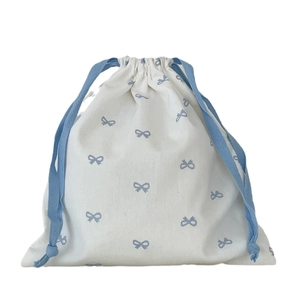 Sweet blue bow print drawstring organizer bag made of durable white cotton fabric