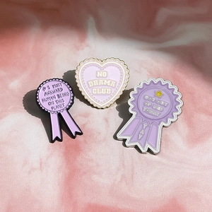 Three-piece purple enamel pin set with NO DRAMA CLUB and GOT OUT OF BED TODAY slogans