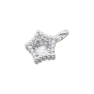 Macro shot of silver square pendant with beaded edge and round cut zircon center