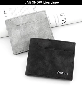 Detailed top view of short frosted matte bi-fold wallets in black and dark grey colors