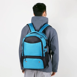 Detail view of sky blue sports backpack with breathable mesh and lower shoe compartment