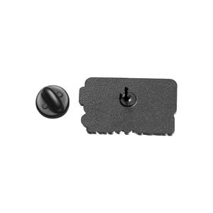 Macro view of rectangle metal badge back with rubber clutch and securing pin