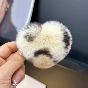 Faux rex rabbit fur heart-shaped hair clip with brown leopard spots on cream base