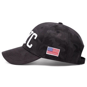 Side view of black camo baseball cap featuring NYC embroidery and USA flag patch details