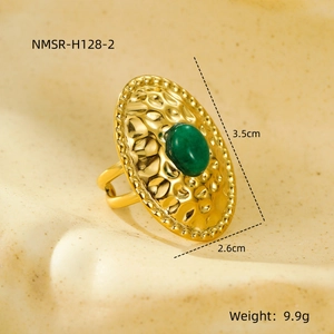 Detail of gold oval ring with green stone showing 3.5cm by 2.6cm dimensions and 9.9g weight