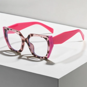 Chic tortoiseshell square frame glasses with contrast pink temples on geometric stand