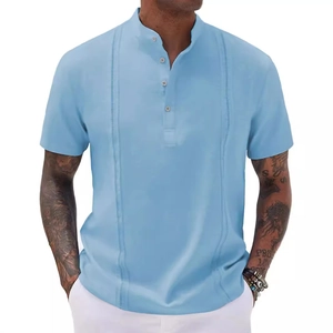 Men's light blue short sleeve Henley shirt with pleated details and linen-like texture