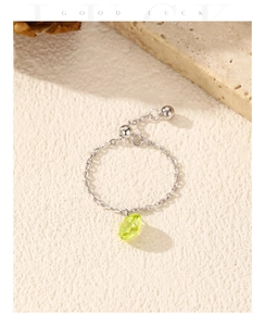 Detailed view of S925 silver chain ring with olive green gem pendant and adjustable slider