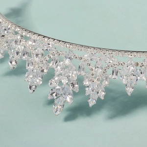 Luxury silver bridal crown featuring teardrop zircon stones and intricate leaf design