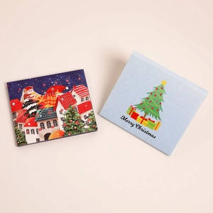 Christmas countdown calendar set featuring Santa puzzle and holiday greeting card