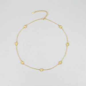 Detail of 925 sterling silver gold daisy flower necklace with adjustable S925 tag