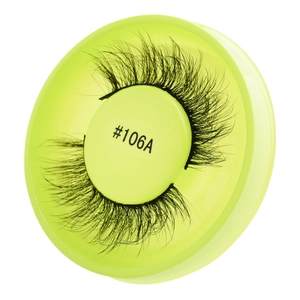 Detailed macro view of self-adhesive false eyelashes #106A in a neon yellow storage tray