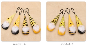 Detail view of handmade bee-themed gnome ornaments with sunflower motifs in Model A and B