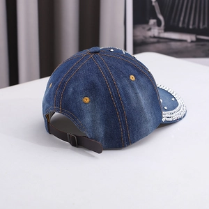 Blue denim baseball cap with rhinestone brim and adjustable leather back strap