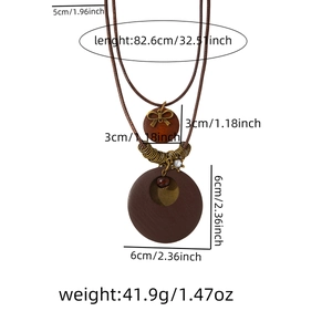 Detail view of bohemian wood necklace with double round bow pendant and size specifications