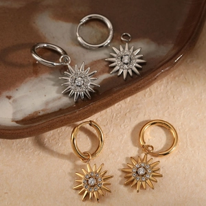 Fashionable stainless steel hoop earrings with sun zircon pendants in gold and silver finish