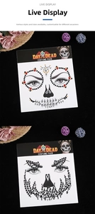 Detail of Halloween sugar skull face jewels with red, yellow and black acrylic rhinestones