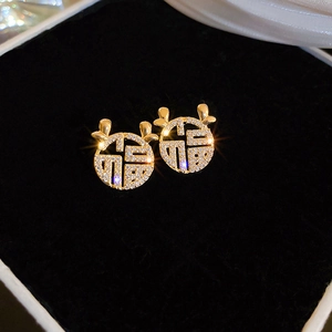 Elegant gold-plated deer antler stud earrings with Fu character and sparkling zircons
