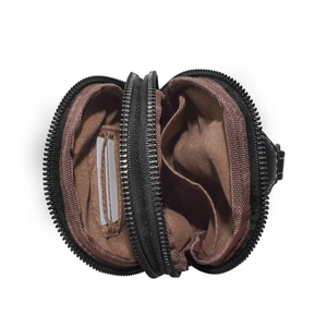 Interior view of bohemian canvas bag featuring dual zippers and brown fabric lining